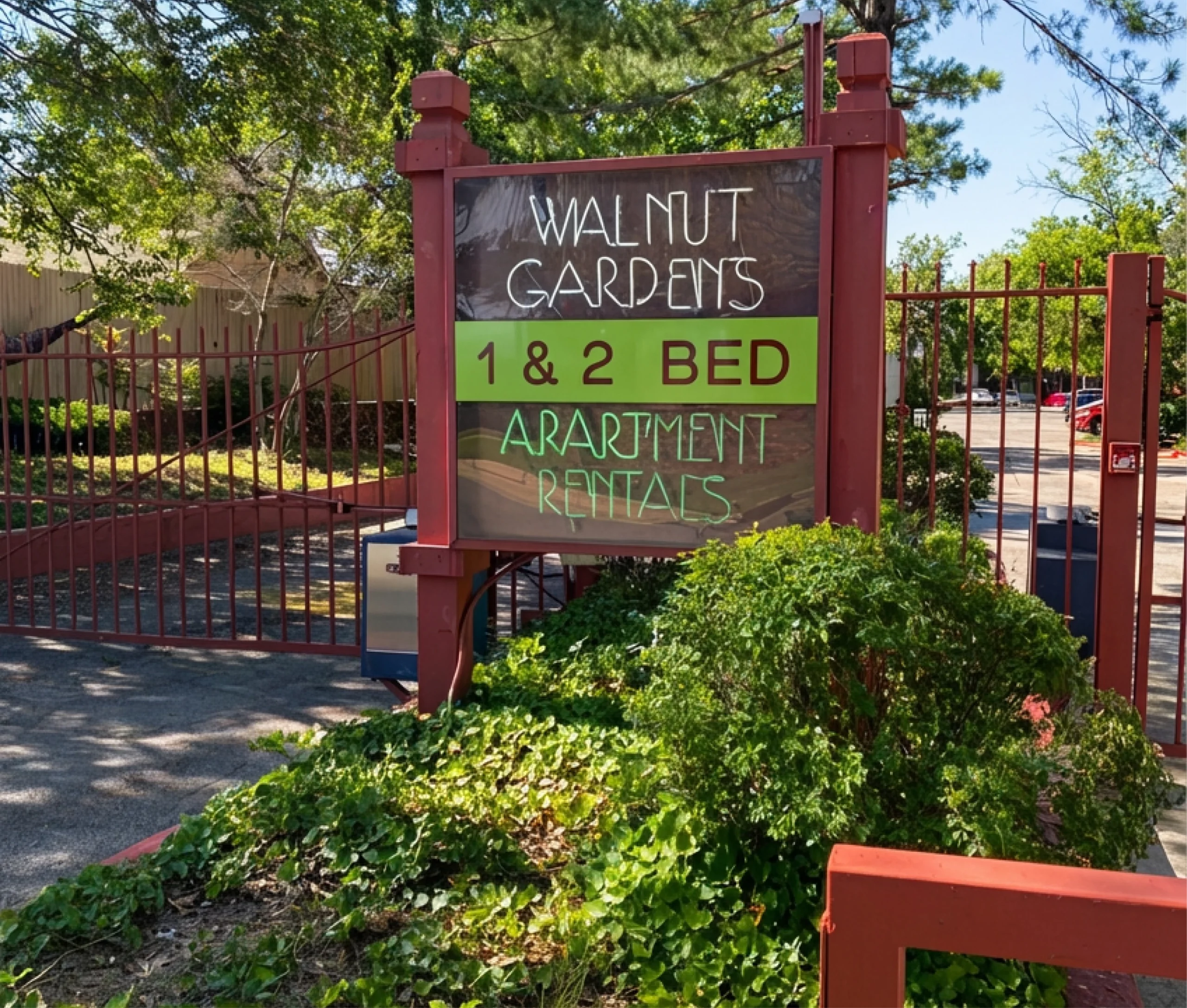 Walnut Gardens Apartments sign advertising 1 and 2 bedroom rentals