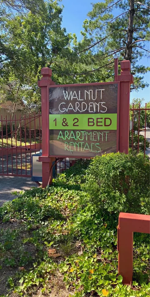 Walnut Gardens Apartments sign showing 1 and 2 bedroom rentals