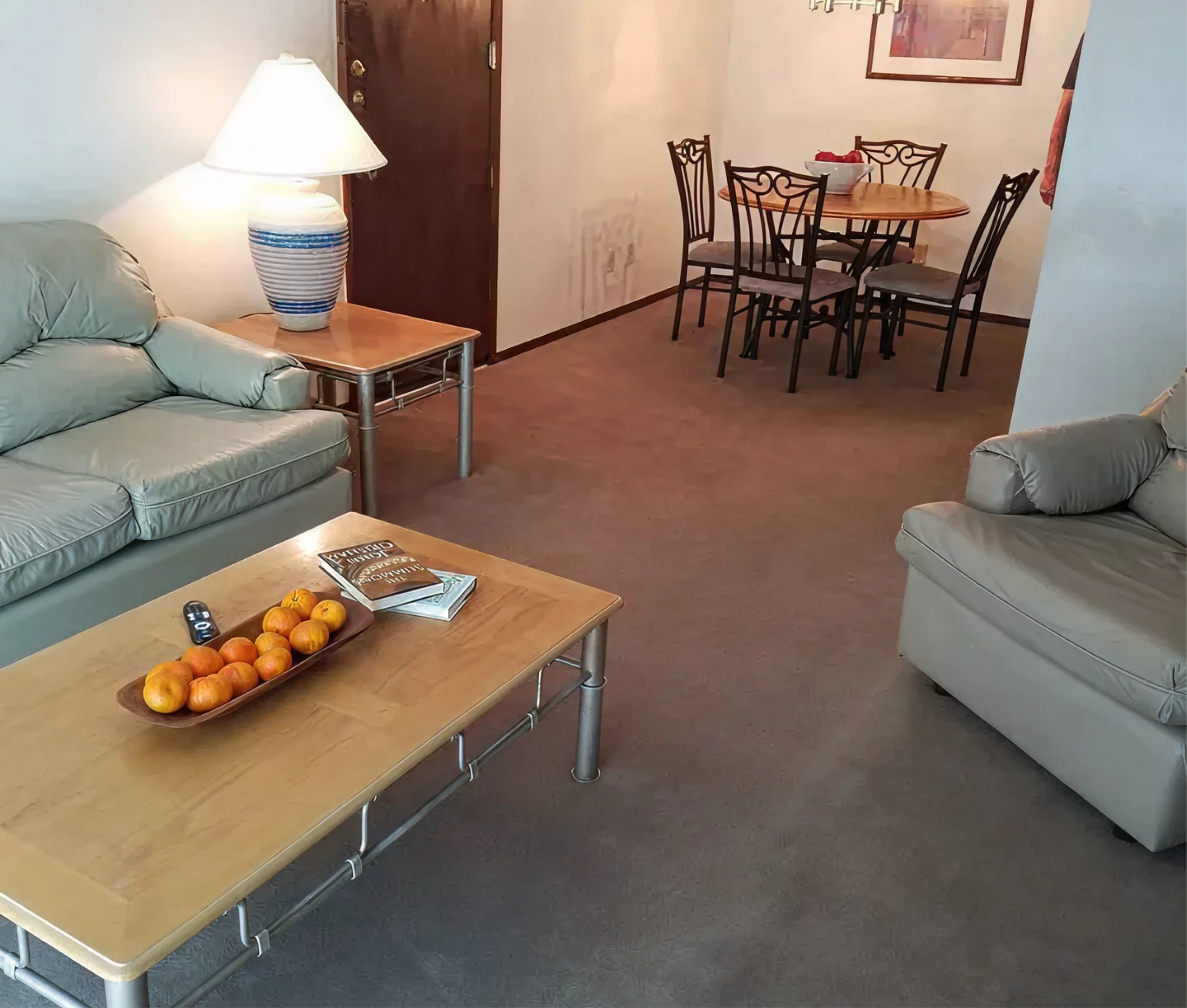Furnished living and dining area at Walnut Gardens Apartments